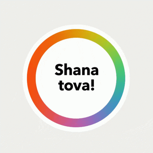 A Rainbow Apple With The Words Shana Tova Written On It GIF