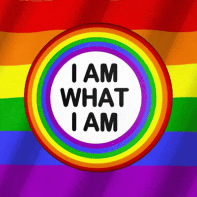 A Rainbow Flag With The Words I Am What I Am In A Circle GIF
