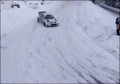 A Rally Car Is Driving Through The Snow And The Bottom Of The Screen Says 4Gifs.com GIF