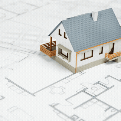 A Real Estate Lawyer In Ontario Is Advertised With A Model House GIF