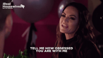 A Real Housewives Advertisement Shows A Woman Smiling GIF