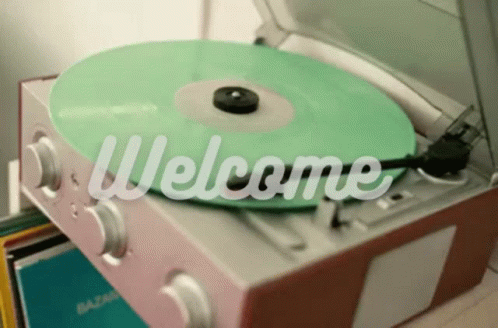 A Record Player With A Green Record On It Says Welcome GIF