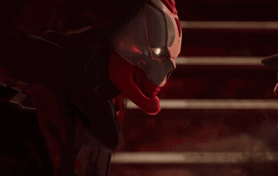 A Red And Black Superhero With A Red Helmet On GIF