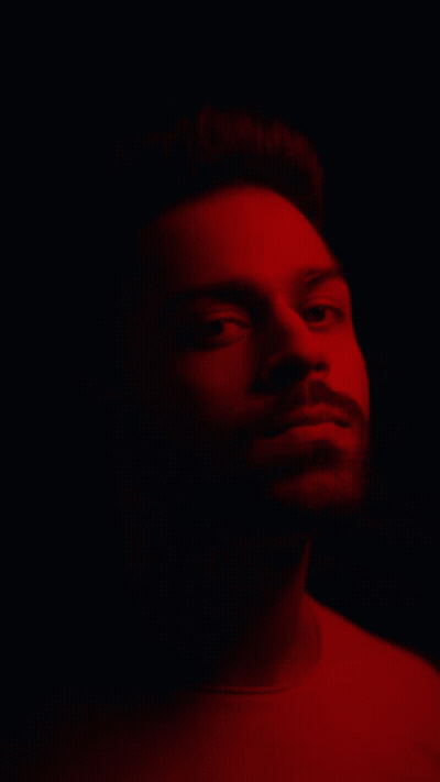 A Red And Blue Background With A Green Line GIF