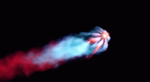 A Red And Blue Smoke Trail From A Rocket GIF