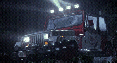 A Red And White Jeep With A License Plate That Says ' Jeep ' GIF