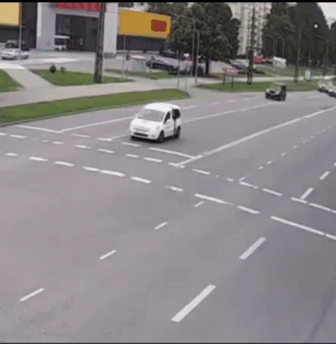 A Red And White Van With The Word Ambulance On The Side GIF