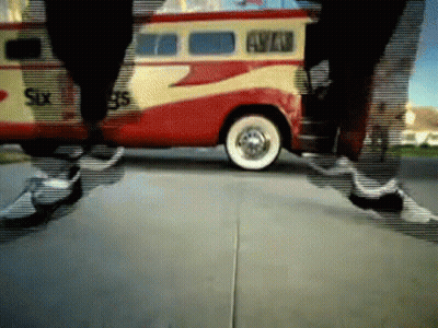 A Red And Yellow Van That Says Six 95 On It GIF