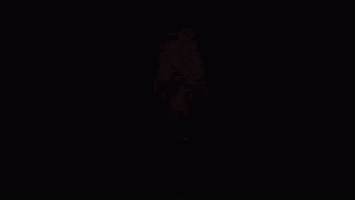 A Red Background With A Light Coming Out Of The Corner GIF