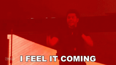 A Red Background With The Words I Feel It Coming In White GIF