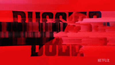 A Red Background With The Words Russian Doll Written In Black GIF