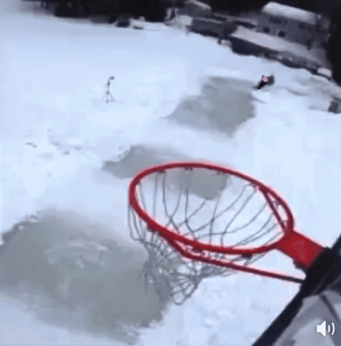 A Red Basketball Hoop In The Snow With A Sound Icon GIF