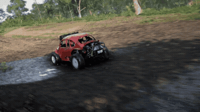 A Red Buggy Is Driving Through A Muddy Area GIF