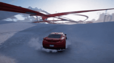 A Red Car Driving Down A Snowy Road GIF