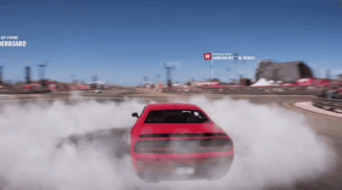 A Red Car Is Drifting In A Video Game With The Word Fame On The Bottom GIF