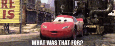 A Red Car Is Driving Down A Dirt Road With The Words What Was That For On The Bottom GIF