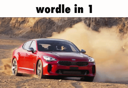 A Red Car Is Driving Down A Dirt Road With The Words Wordle In 1 Written Above It GIF
