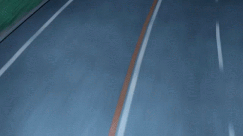 A Red Car Is Driving Down A Road With A License Plate That Says ' A ' GIF