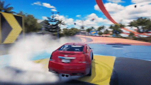 A Red Car Is Driving On A Track With Smoke Coming Out Of The Back GIF