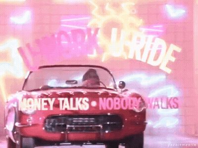 A Red Car Is Parked In Front Of A Neon Sign That Says " Money Talks Nobody Walks " GIF