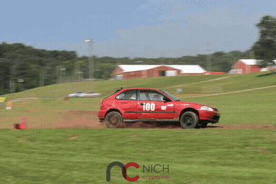 A Red Car That Has The Number 100 On It GIF