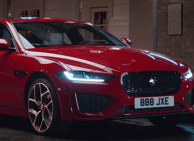 A Red Car With The License Plate 888Jxe GIF