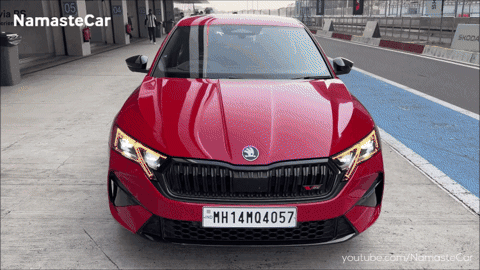 A Red Car With The License Plate Mh14m0457 GIF