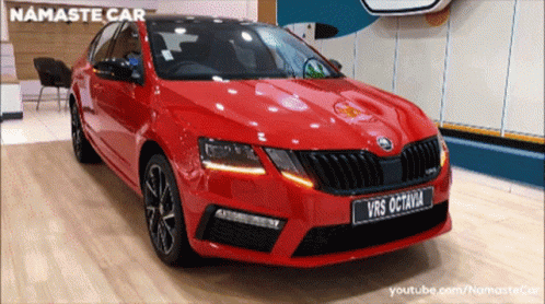 A Red Car With The License Plate Vrs Octavia GIF