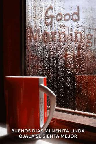 A Red Coffee Mug Sits In Front Of A Window With The Words Good Morning Written On It GIF