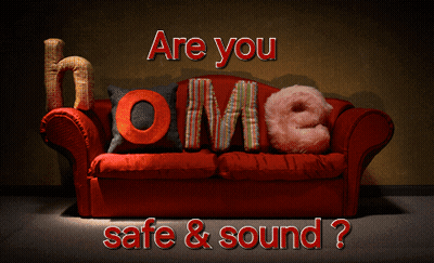 A Red Couch With The Words " Are You Home Safe & Sound " Written On It GIF