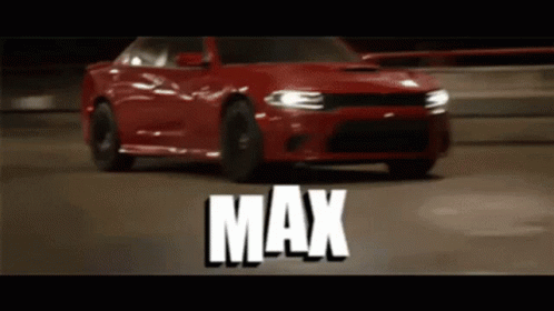 A Red Dodge Charger Is Driving On A Highway With The Word Max Written On The Bottom GIF