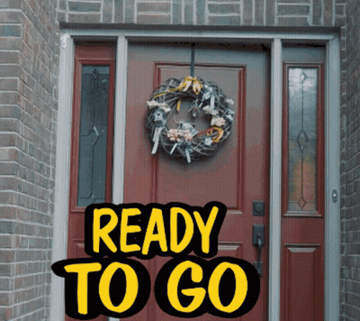 A Red Door With A Wreath Hanging On It And The Words Ready To Go Above It GIF