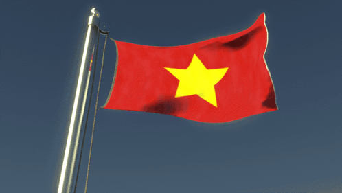 A Red Flag With A Yellow Star On It Is Flying In The Wind GIF