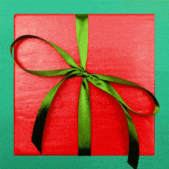 A Red Gift With A Green Ribbon Tied In A Bow GIF