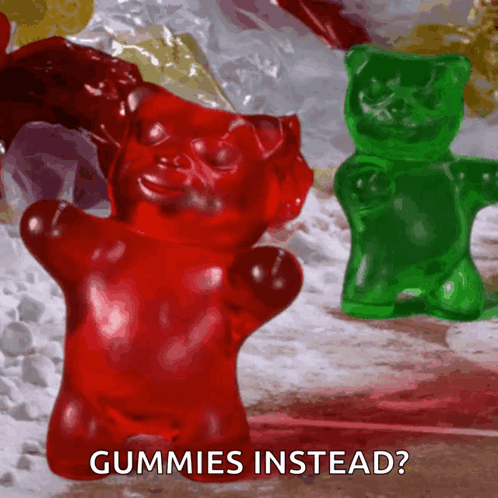A Red Gummy Bear And A Green Gummy Bear Are Standing Next To Each Other With The Words Gummies Instead On The Bottom GIF