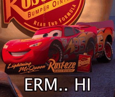 A Red Lightning Mcqueen Car With Rusteze On The Side Of It GIF