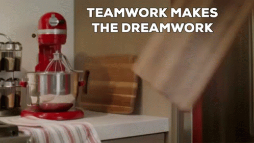 A Red Mixer Is Sitting On A Kitchen Counter With The Words Teamwork Makes The Dreamwork Written Above It GIF