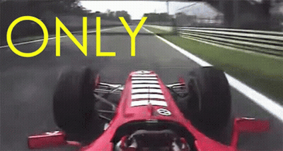 A Red Race Car Is Driving Down A Track With The Word Only Written In Yellow GIF