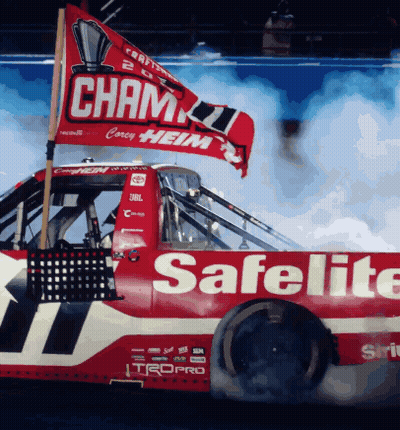 A Red Race Car With The Word Safelite On It GIF