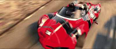 A Red Racing Car With The Number 12 On The Side GIF