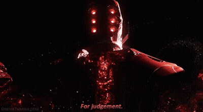 A Red Robot Says For Judgement In The Dark GIF