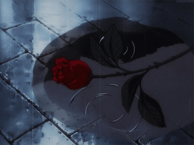 A Red Rose Is Laying In A Puddle Of Water On A Tiled Floor GIF
