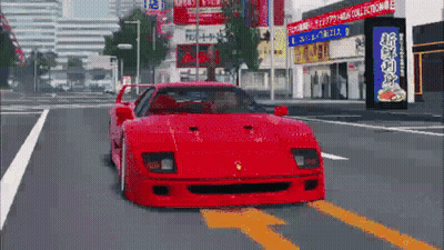 A Red Sports Car Is Driving Down A Street In Front Of A Building With A Sign That Says 1 3 4 5 6 7 8 9 GIF