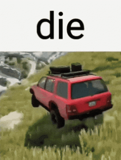 A Red Suv Is Driving Down A Grassy Hill With The Word Die On The Bottom . GIF