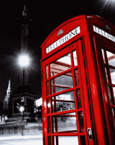 A Red Telephone Booth With The Word Telephone On The Front GIF