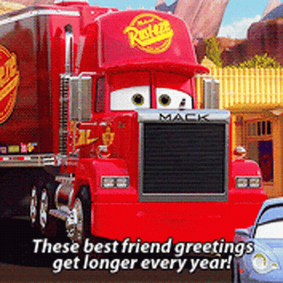 A Red Truck With The Word Mack On The Front GIF