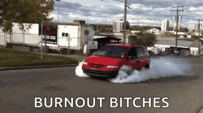 A Red Van Is Driving Down A Street With Smoke Coming Out Of It And The Words Burnout Bitches On The Bottom . GIF