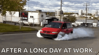 A Red Van Is Driving Down A Street With Smoke Coming Out Of The Tires And The Words After A Long Day At Work Below It GIF