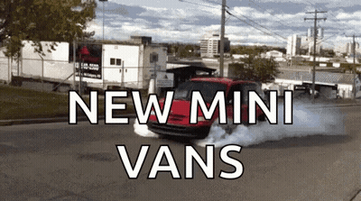 A Red Van Is Driving Down A Street With The Words " New Mini Vans " Written On The Bottom GIF