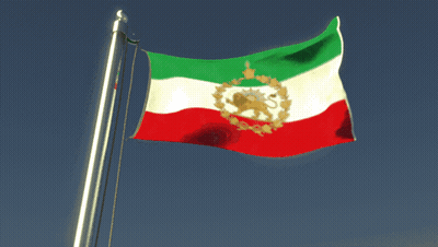 A Red White And Green Flag With A Lion On It Is Flying In The Wind GIF